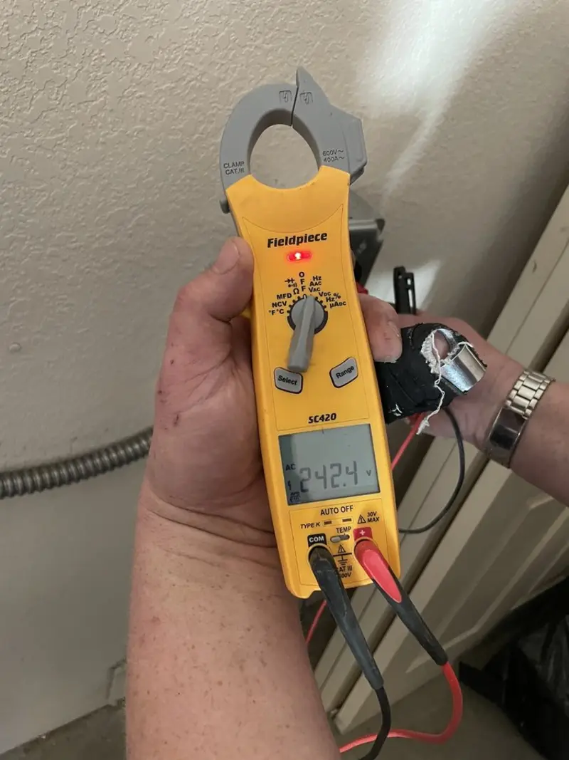Voltage testing with clamp meter during Aluminum Wiring Replacement in Crossett